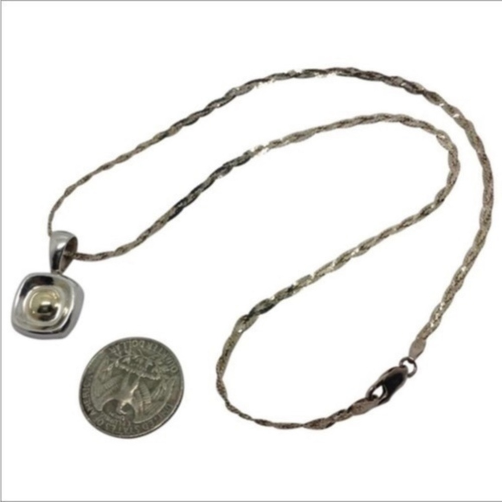 Silpada pendant hangs on sterling silver chain